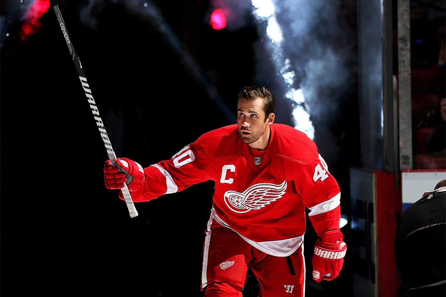 DETROIT, MI - OCTOBER 2: Henrik Zetterberg #40 of the Detroit Red Wings skates onto the ice after being introduced for the pre-game ceremonies before an NHL game against the Buffalo Sabres at Joe Louis Arena on October 2, 2013 in Detroit, Michigan. The Wings won 2-1 (Photo by Dave Reginek//NHLI via Getty Images)